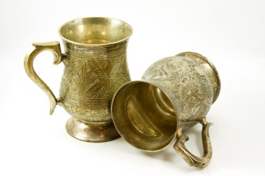 Two ancient silver tankards clipart