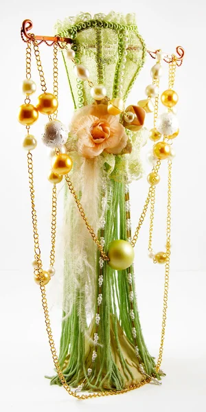 Glassbeads hanging on special mannequin — Stock Photo, Image