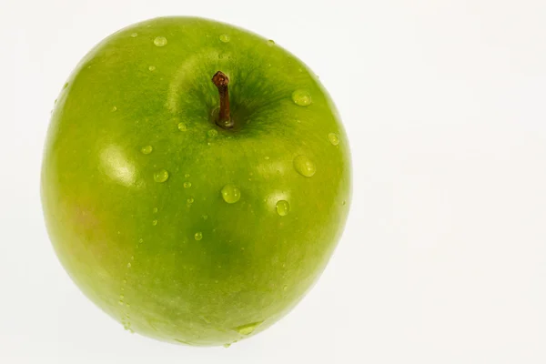 Πράσινο μήλο με σταγόνες νερού — Φωτογραφία Αρχείου
