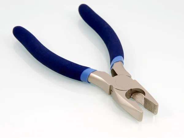 Pliers with reflections on white — Stock Photo, Image