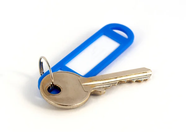 Key with blue plastic label — Stock Photo, Image