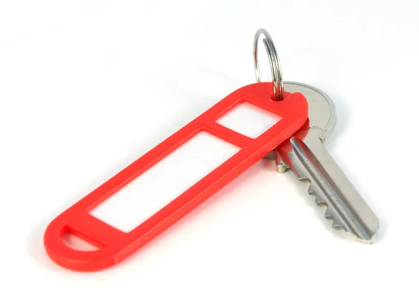 Key with red blank label — Stock Photo, Image