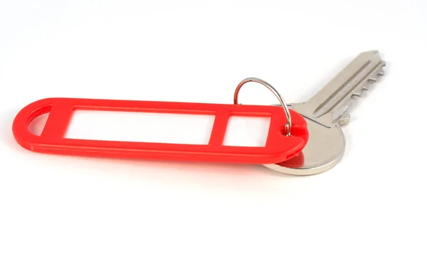 Key with plastic red label — Stock Photo, Image