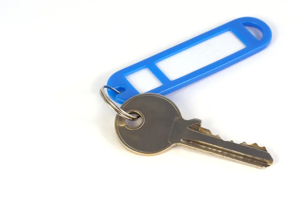 Key with blue plastic label — Stock Photo, Image