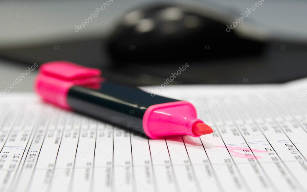 Soft-tip pen on report sheet