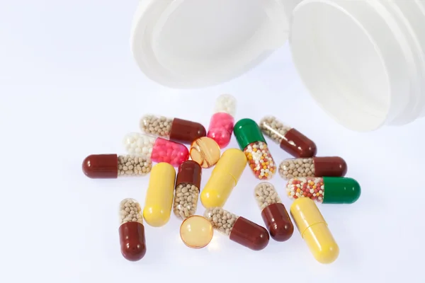 stock image Pills spilling out from medicine box