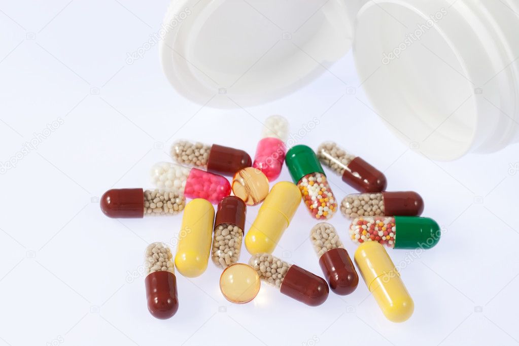 Pills spilling out from medicine box