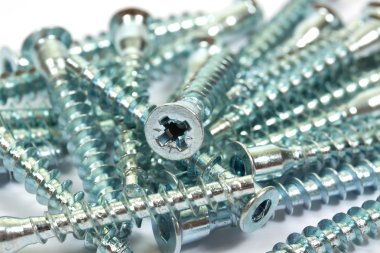 Closeup of metal screws clipart