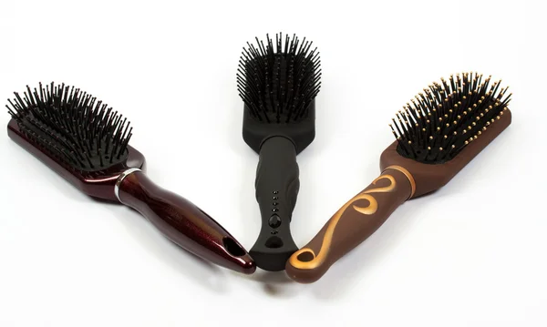 Three hairbrushes over white — Stock Photo, Image