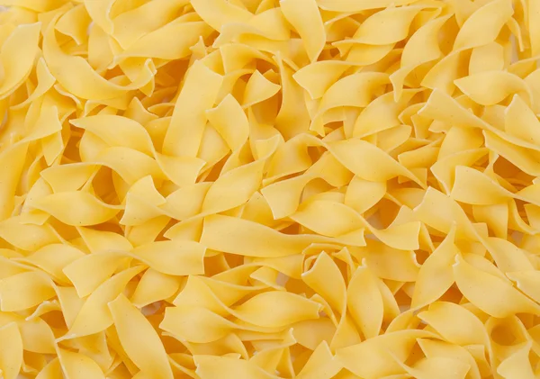 Fechar de macarrão italiano amarelo — Fotografia de Stock