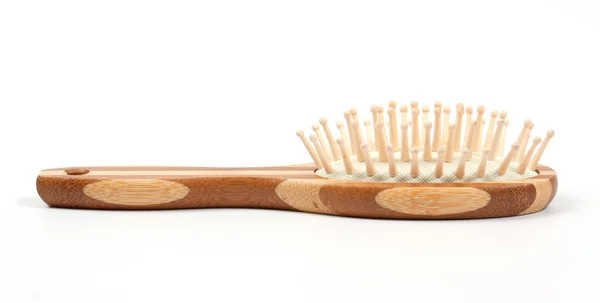 Wooden massage comb over white — Stock Photo, Image