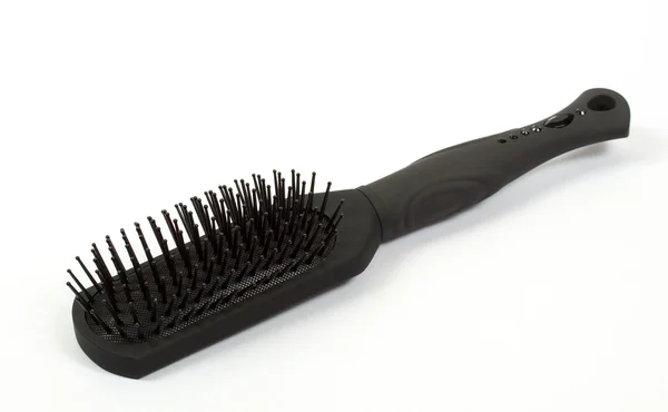 Massage hairbrush over white — Stock Photo, Image