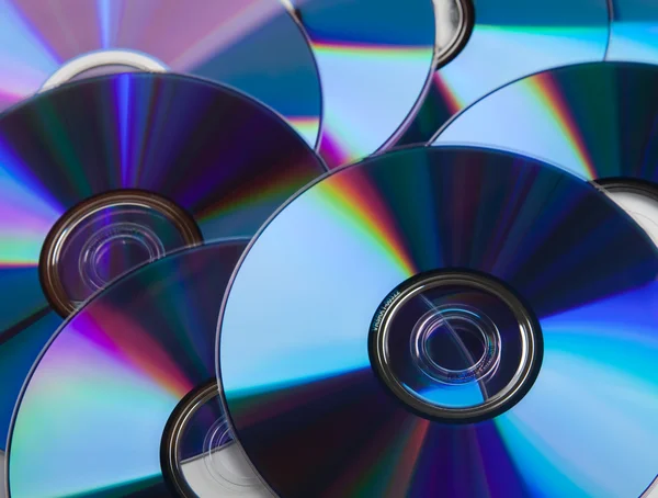 Many DVDs as background — Stock Photo, Image