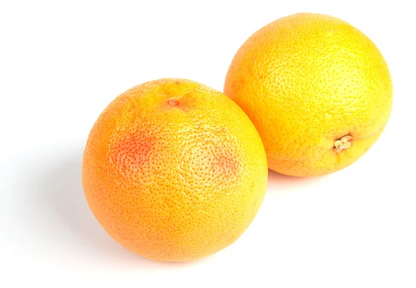 Два спелых грейпфрута — стоковое фото