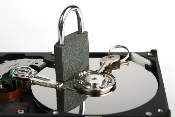 Padlock and key on hard drive — Stock Photo, Image