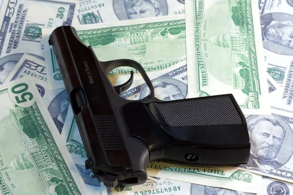 Pistolet et argent Images De Stock Libres De Droits