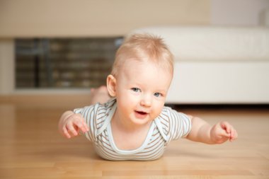 Baby on a floor clipart