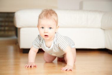 Baby on a floor clipart