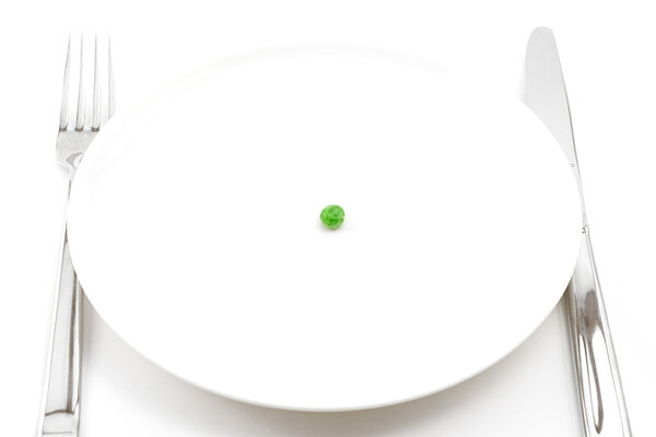 Single pea on a plate