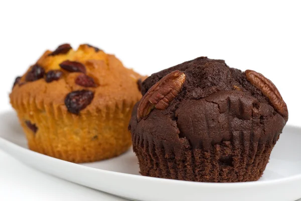 Twee muffins op een plaat — Stockfoto