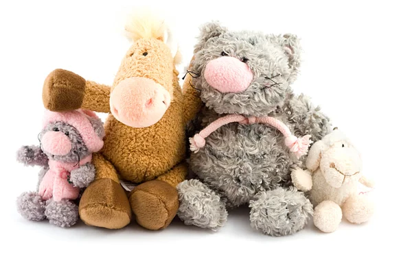 Quatro brinquedos de pelúcia — Fotografia de Stock