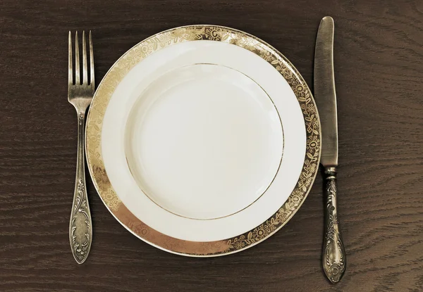 Tenedor, cuchillo y plato —  Fotos de Stock
