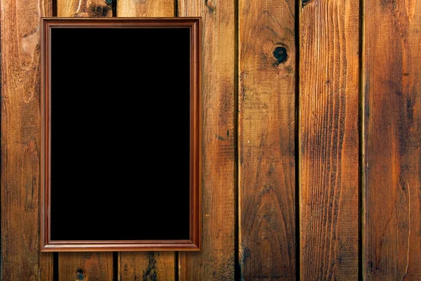 Vintage frame on wooden wall — Stock Photo, Image