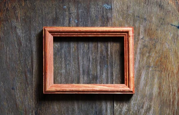Leeg frame op houten achtergrond — Stockfoto