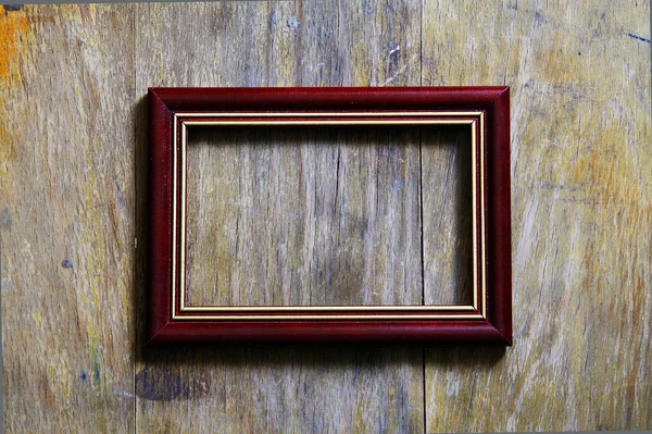 Пустая рамка на деревянном фоне — стоковое фото