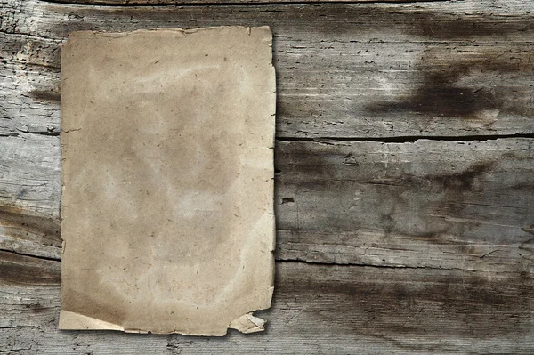 Vintage papier op hout textuur — Stockfoto