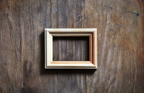 Leerer Rahmen auf Holzgrund — Stockfoto