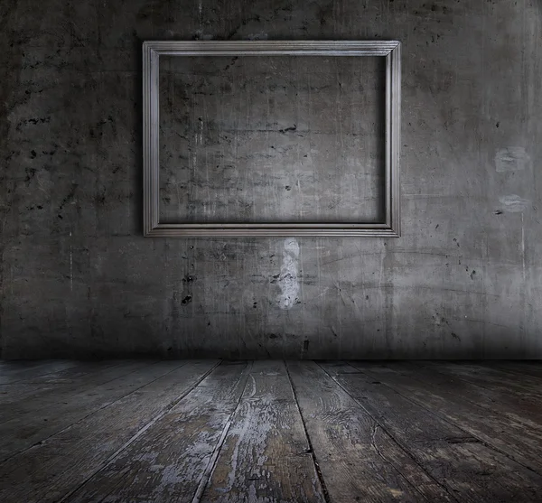 Grunge interior with picture frame — Stock Photo, Image