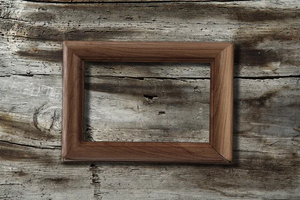 Frame op houten achtergrond — Stockfoto