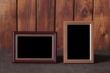 Photo frames on table clipart