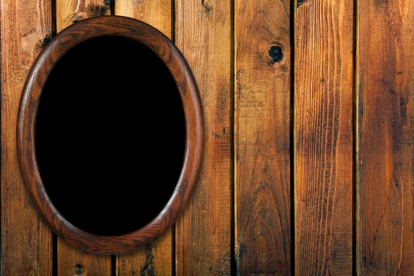 Винтажная рама на деревянной стене — стоковое фото