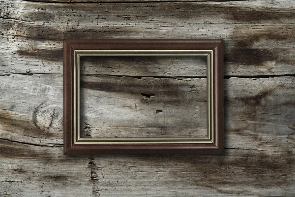 Marco sobre fondo de madera — Foto de Stock
