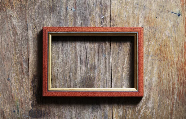 Marco vacío sobre fondo de madera —  Fotos de Stock