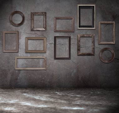 Grunge room with wooden frames clipart