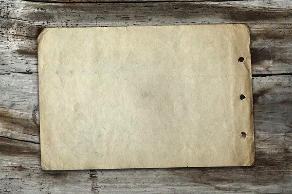 Carta vintage su texture in legno — Foto Stock
