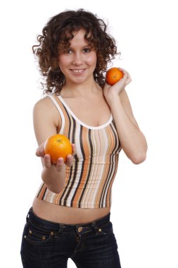 Smiling young healthy woman is holding t clipart