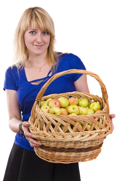 Meisje met een mand van appels. — Stockfoto