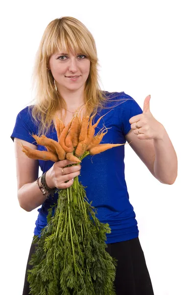 Meisje bedrijf bos van wortelen — Stockfoto