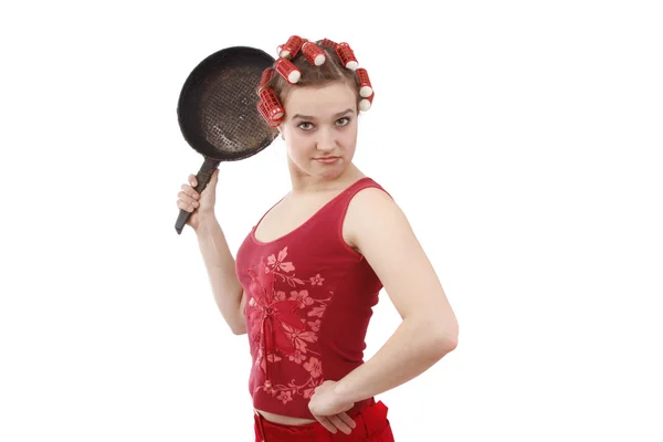 Домохозяйка с трюмной сковородкой — стоковое фото