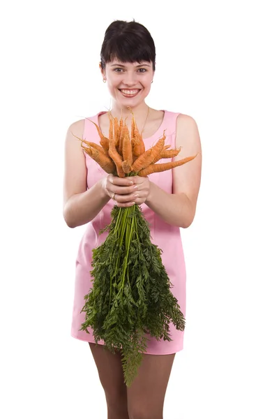 Woman with carrot Royalty Free Stock Images