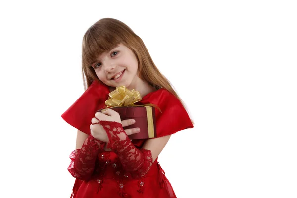 Klein meisje met geschenk. — Stockfoto