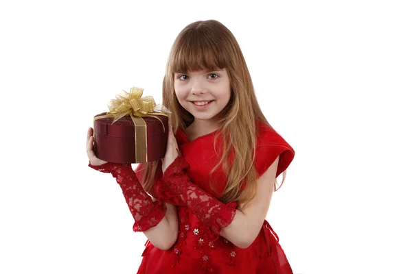 Kleines Mädchen mit Geschenk. Stockbild