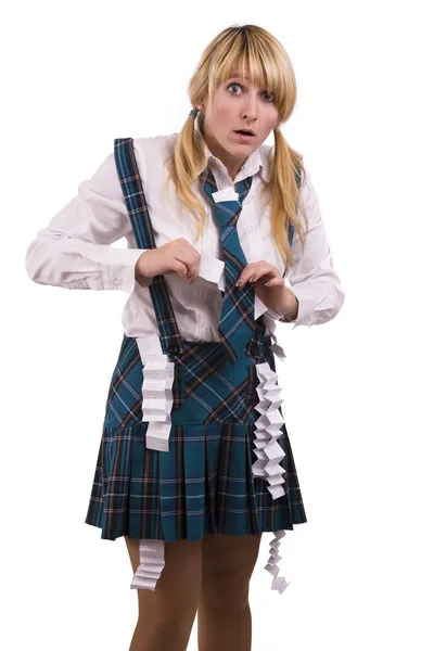 Escola menina escondendo berço folha em uniforme — Fotografia de Stock