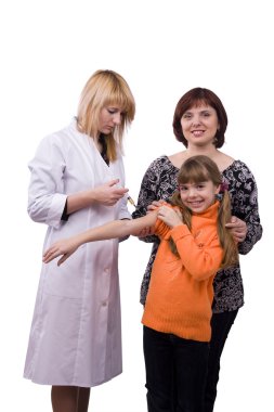 Doctor giving little girl an injection clipart