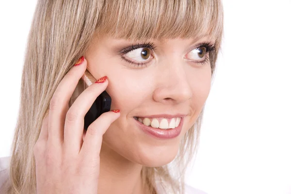Leende flicka talar på mobiltelefonen — Stockfoto