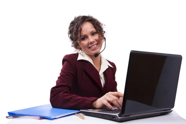 Vrouw met headset en laptop — Stockfoto